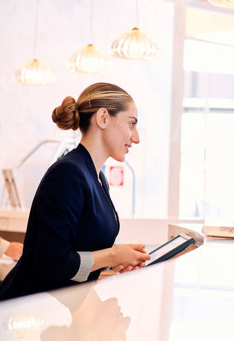 Couple speaking at the receptionist