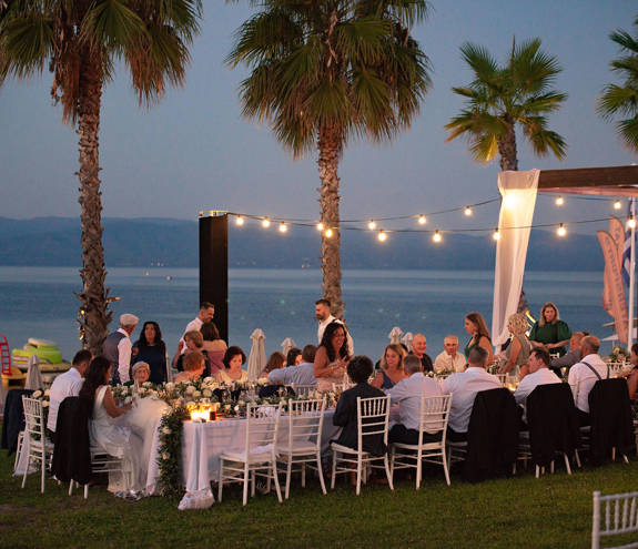 Miraggio Thermal Spa Resort wedding table area lit up at night time and full of guests