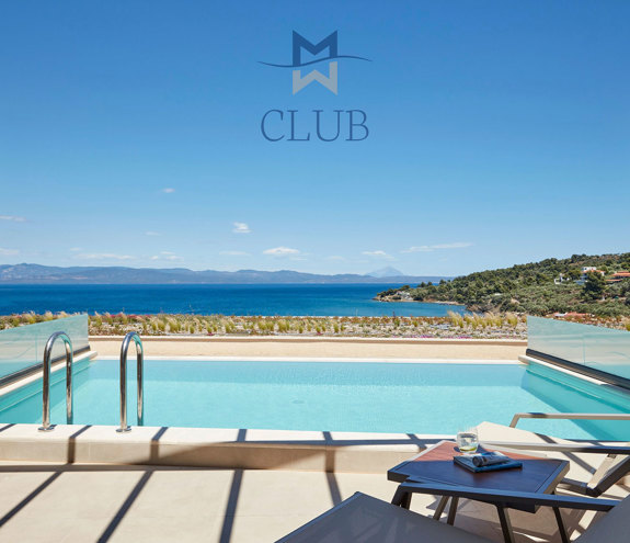 Club sea view room's private terrace with pool, sun loungers under wooden pergola and bamboo wall dividers