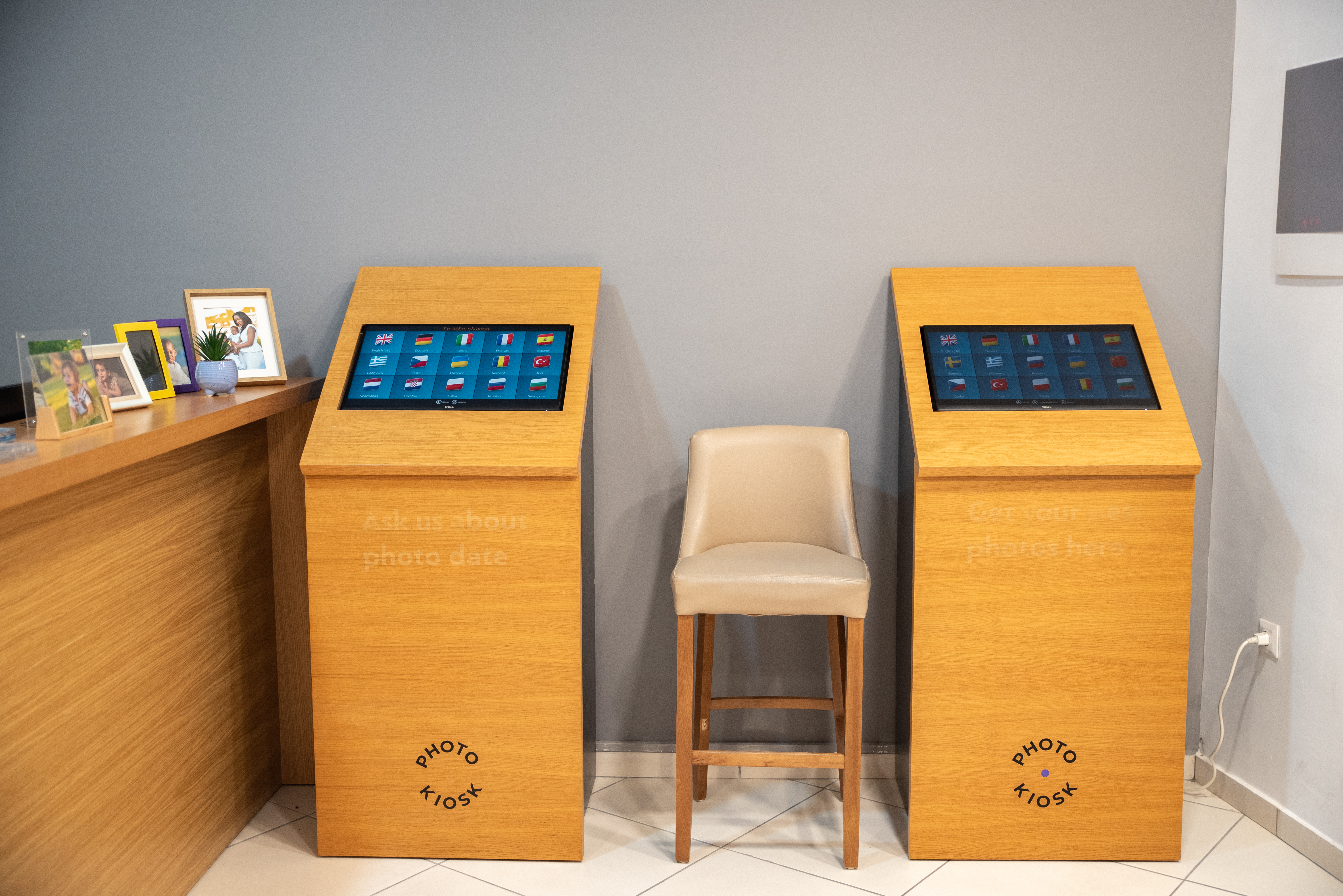 Photo kiosks with multilingual menu where guests can view and print their pictures