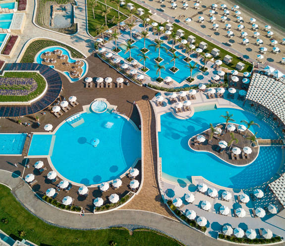 Sky high view of the pools and the beach