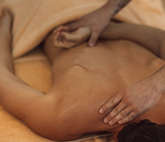 Close up of therapeutic back massage session promoting relaxation and muscle relief