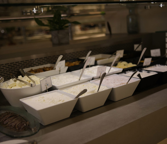 Close up to creme and pasta salads in Kritamo restaurant 