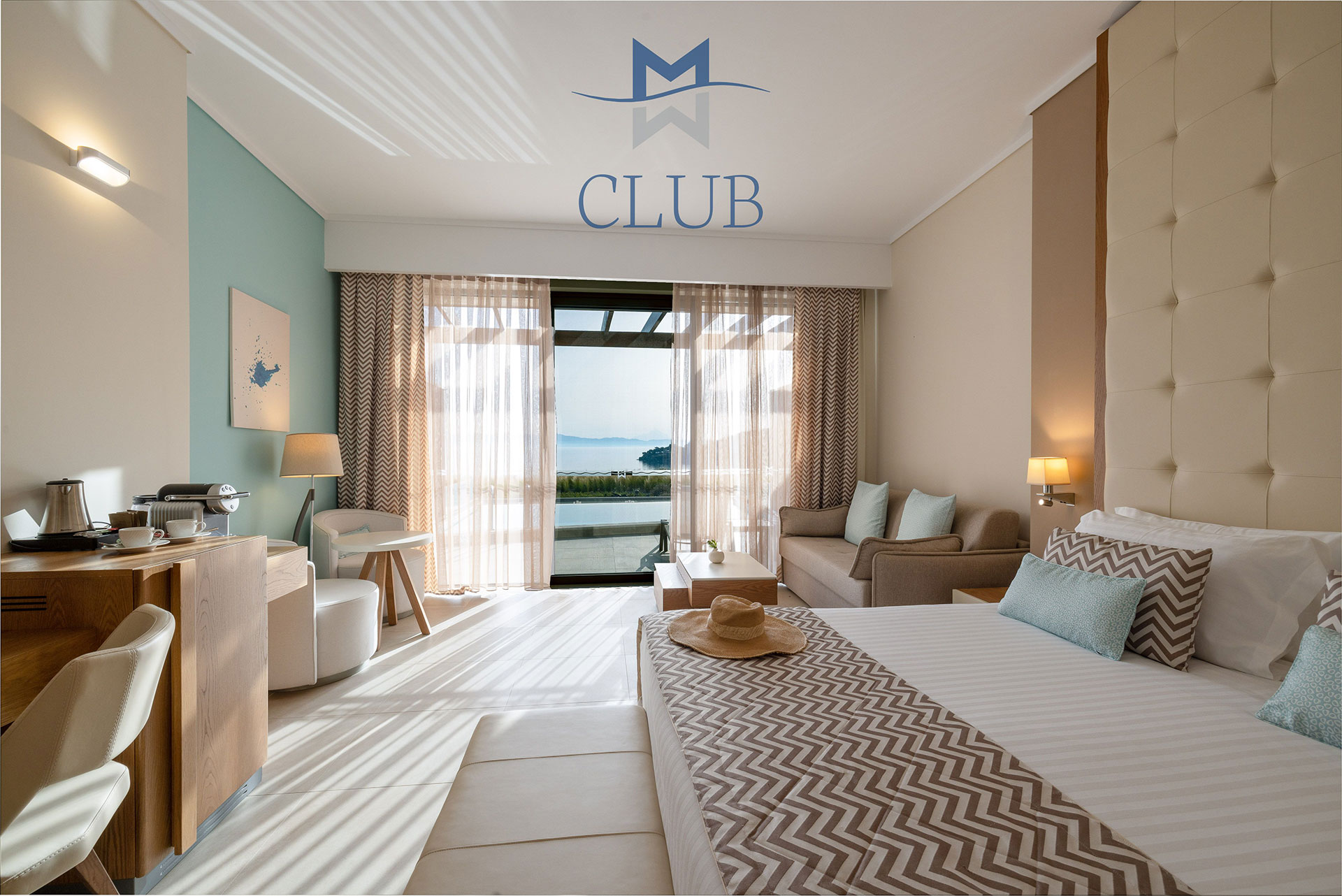 Club sea view room modern designs, light blue accents, seating area and access to private pool