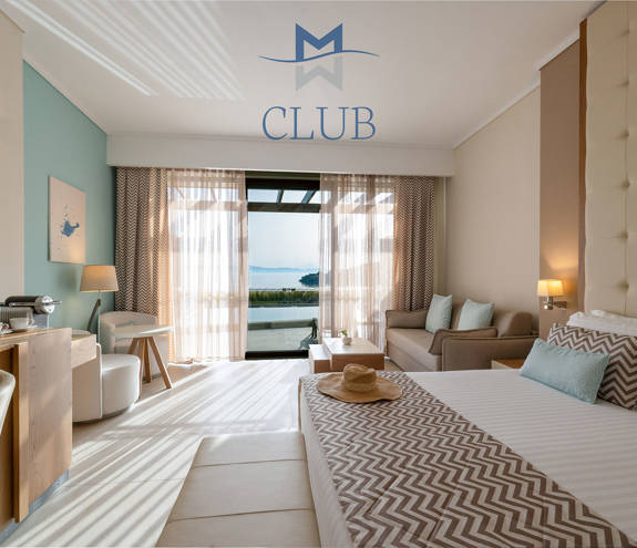 Club Sea View Private Pool bed, sofa, chairs and amenities
