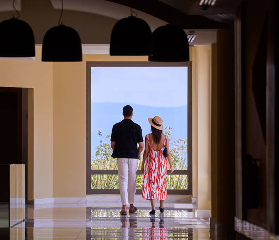 A couple walking in the lobby