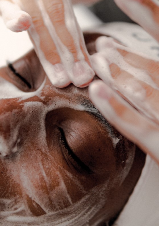Relaxing facial cleansing treatment with gentle foam and massage