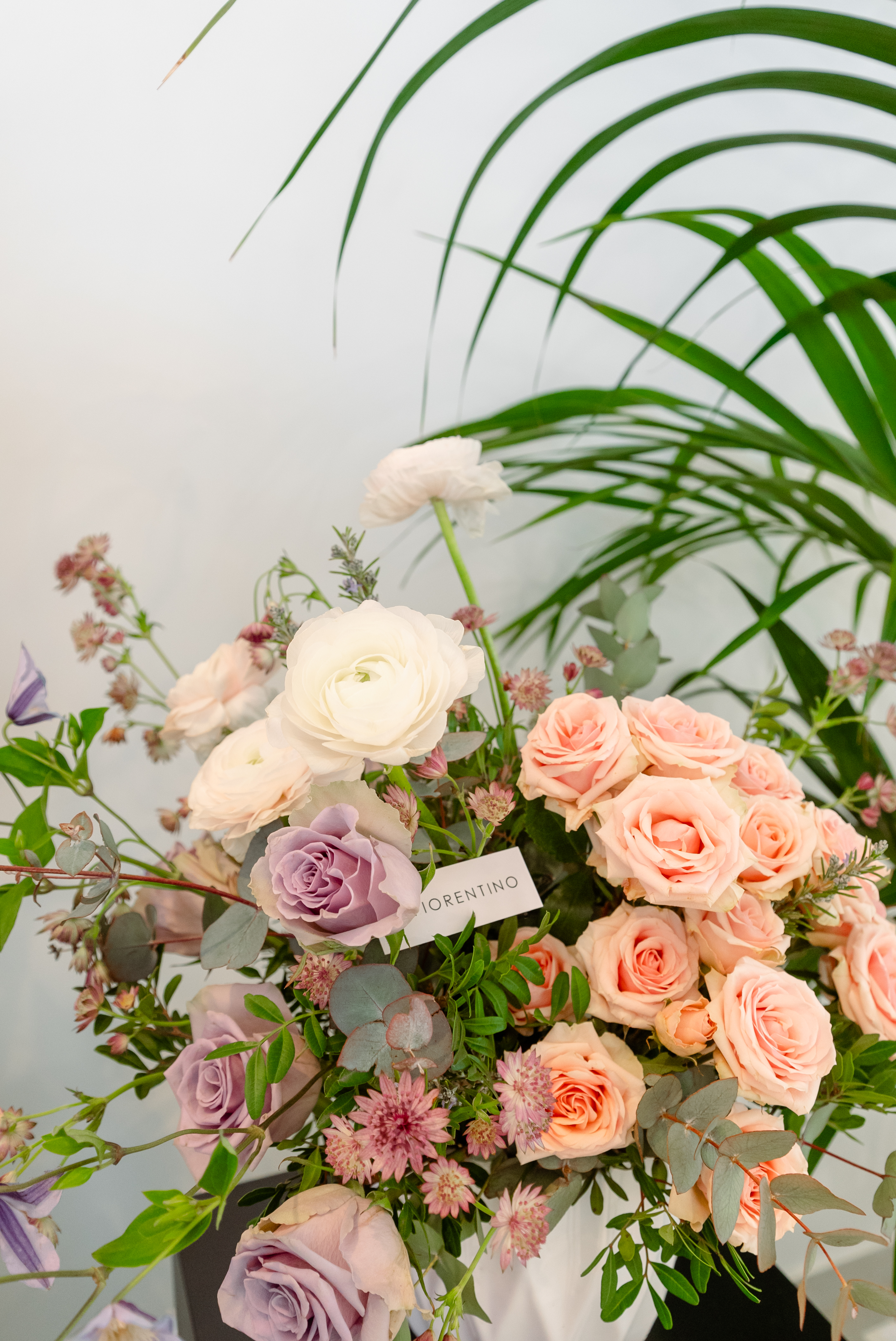 Bouquet of roses and mixed flowers in soft pastel pink tones
