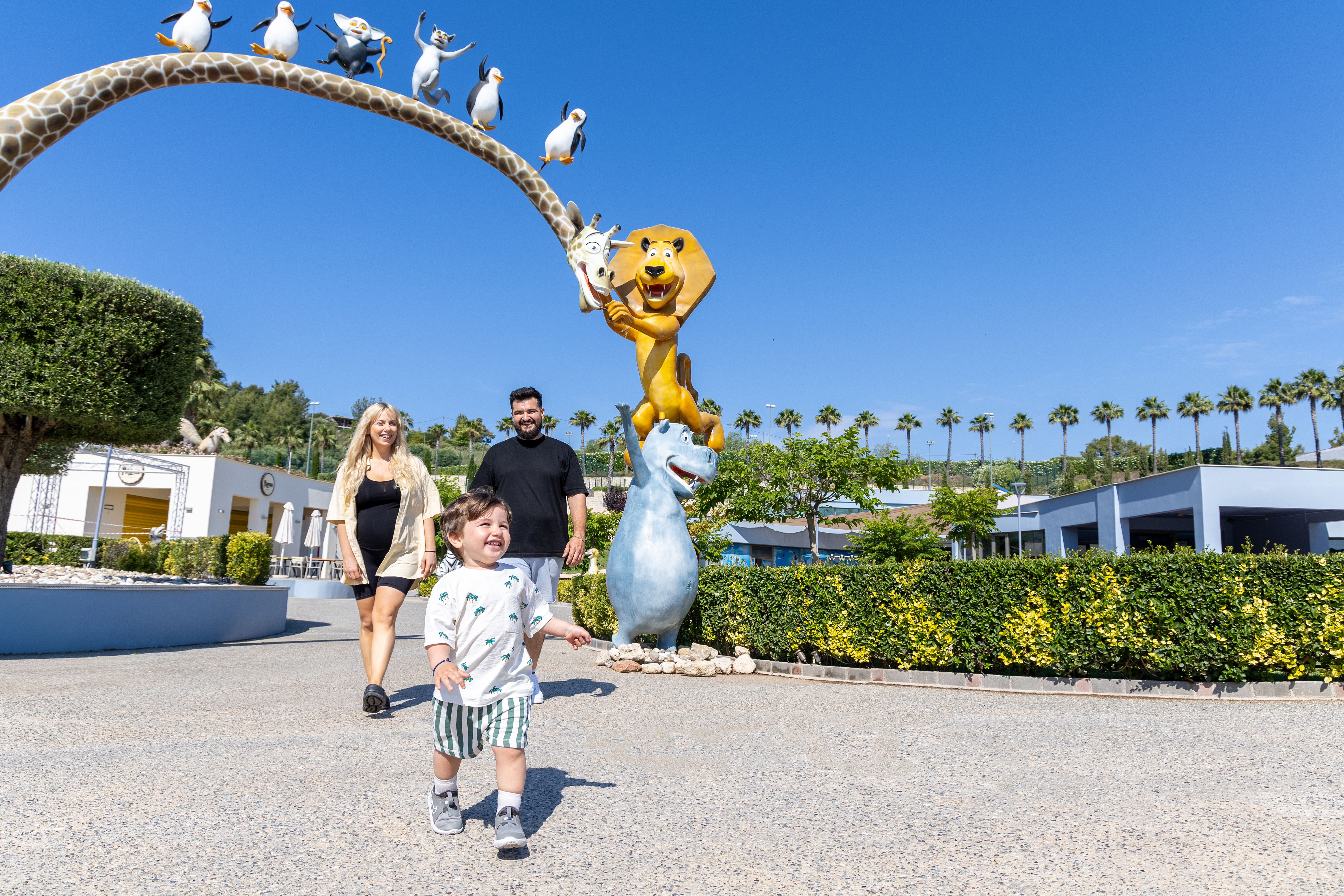 Happy family enjoy walking outside of Kids Planet 