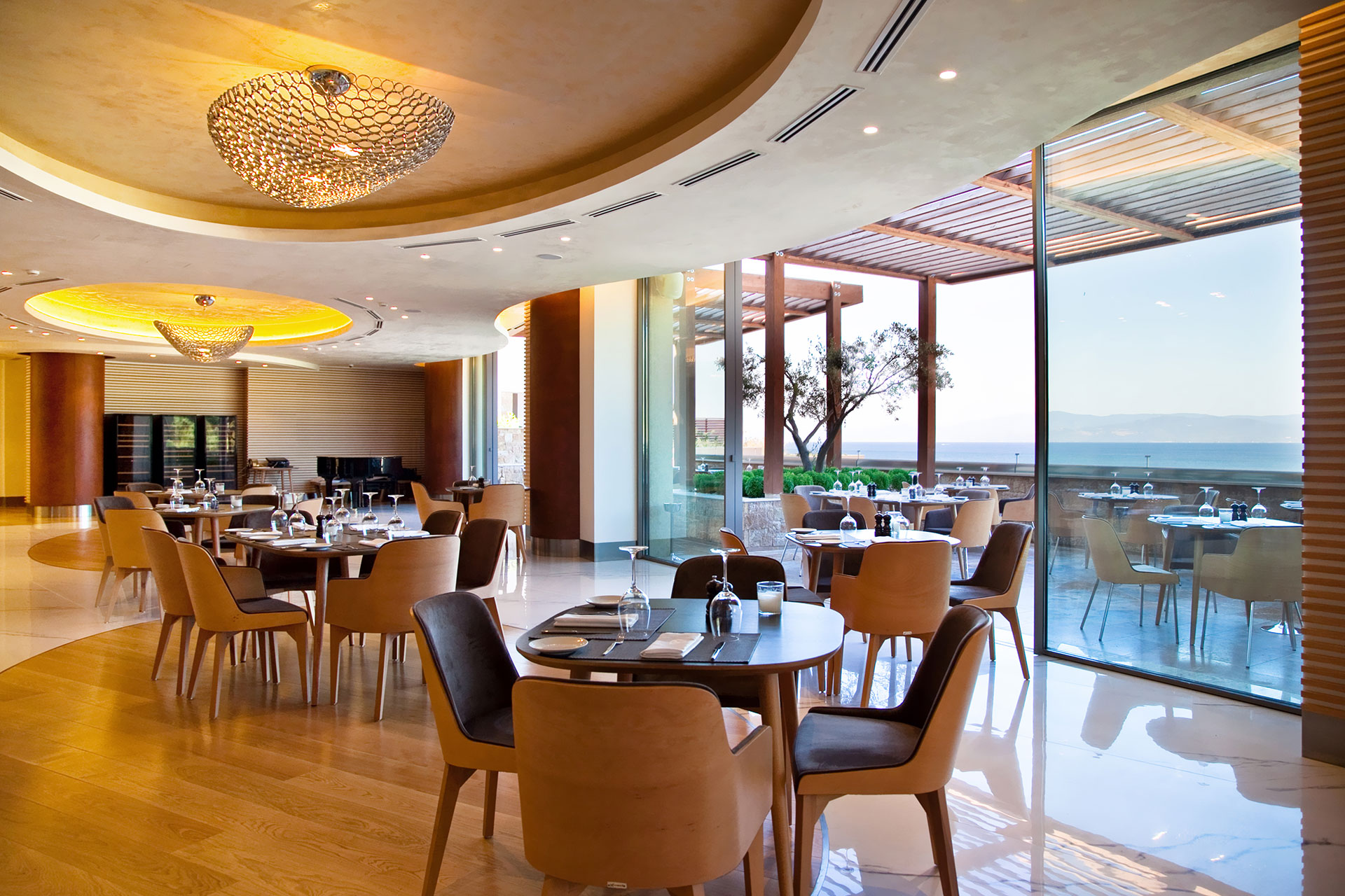 Modern Portofino restaurant with sea view terrace and elegant dining setup