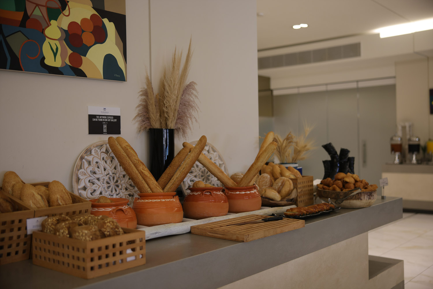 Bread corner of Kritamo restaurant's buffet with baguettes, and other breads to choose from