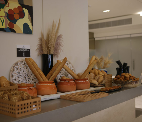 Bread corner of Kritamo restaurant's buffet with baguettes, and other breads to choose from