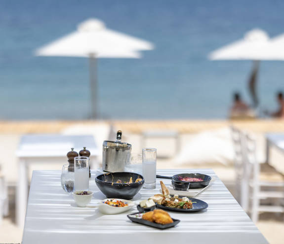 Mezedaki Beach Restaurant table with food
