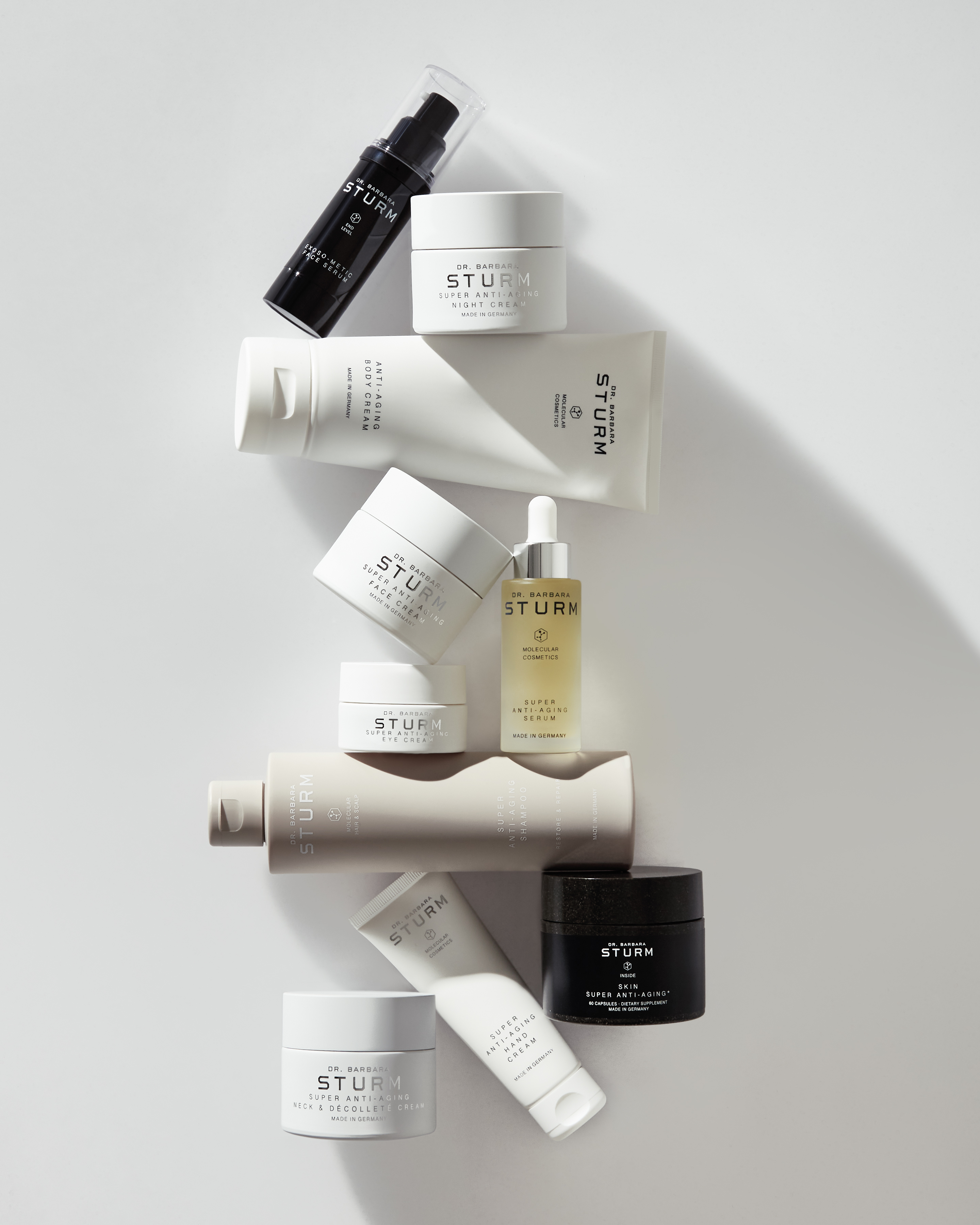Complete Dr. Barbara Sturm anti-aging skincare collection displayed on white surface