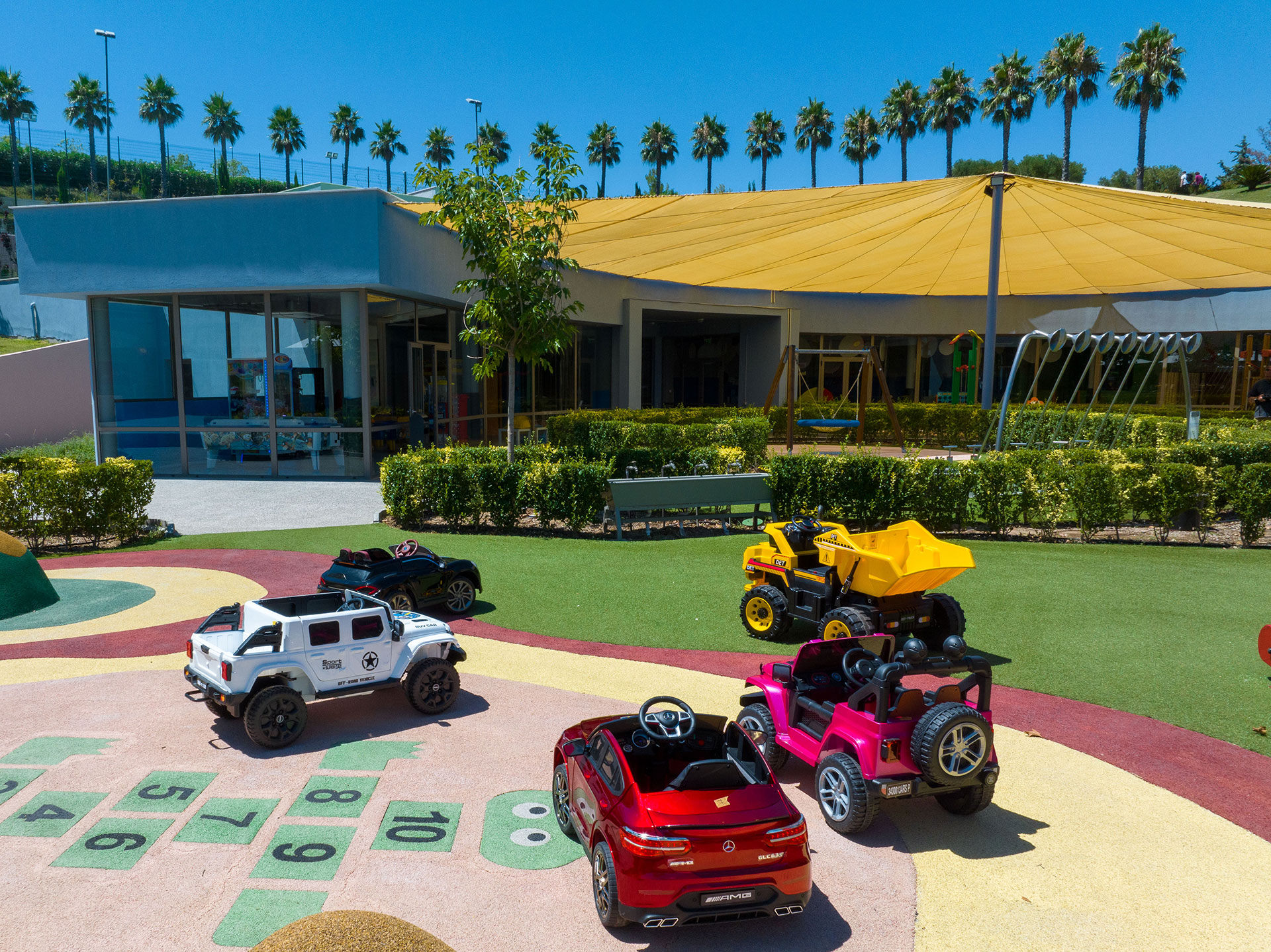 Car toys in the outdoor playground in Kids Planet