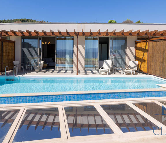 Miraggio Sea View Private Pool Suite pool and sunbeds from the front