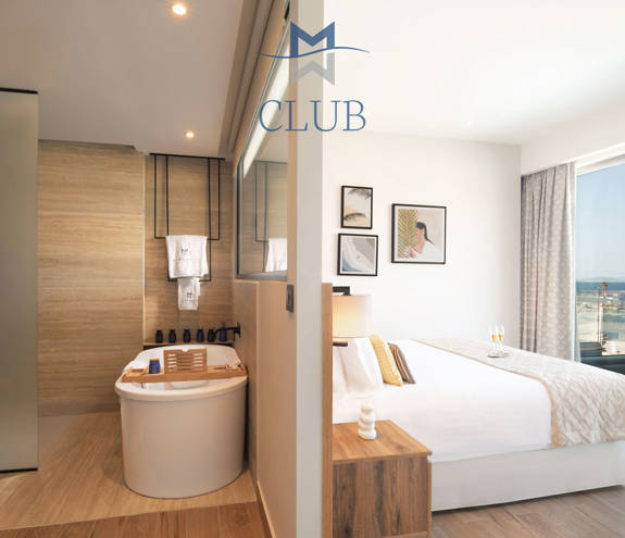 Miraggio Duplex Private Pool Suite bathtub and bed