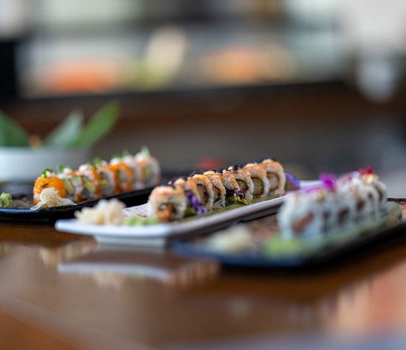 Assorted sushi rolls with colorful toppings and wasabi at the Lobby Sushi Bar