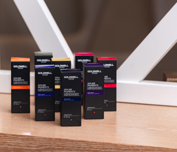 Goldwell Pure Pigments professional hair color products on display 