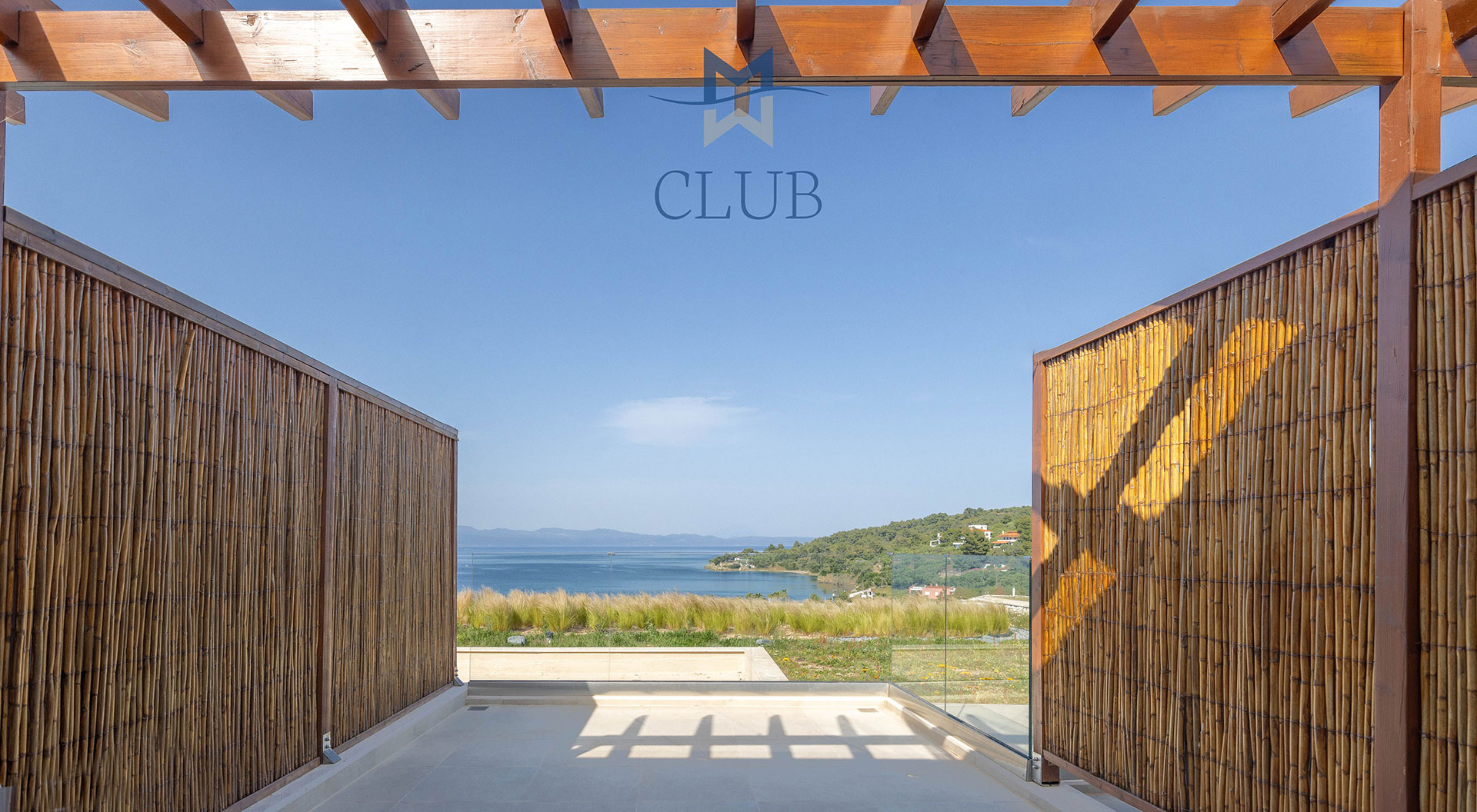 Club sea view room private terrace with bamboo walls, wooden pergola and stunning sea view