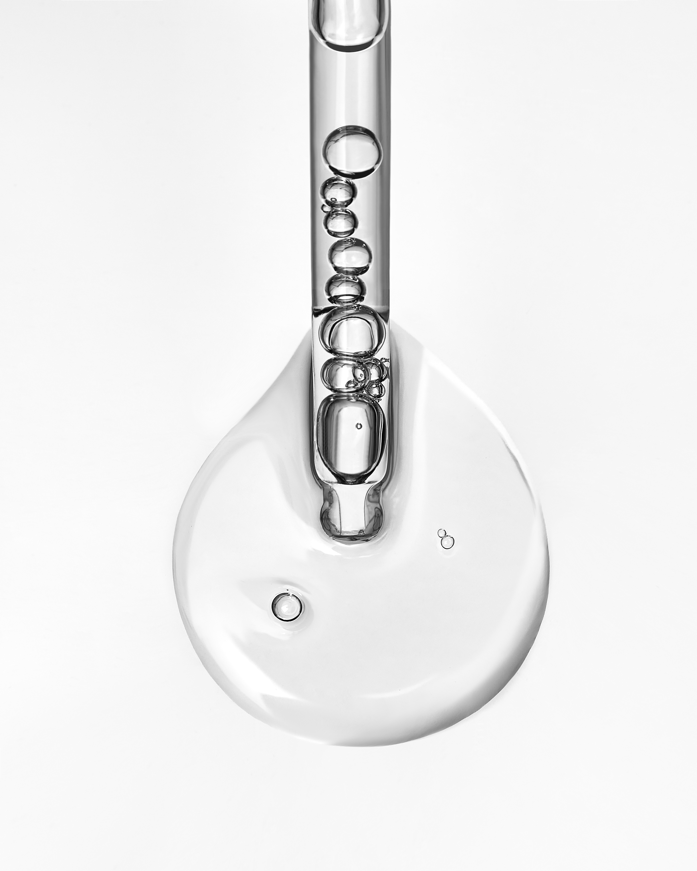 Close-up of a serum texture with air bubbles representing purity and hydration