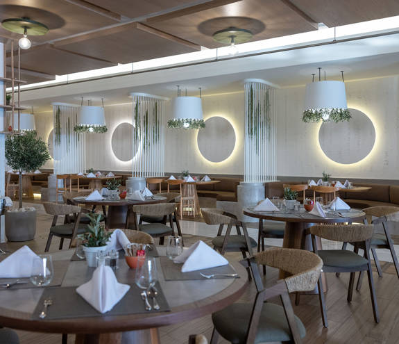 Elia Restaurant round tables with chairs