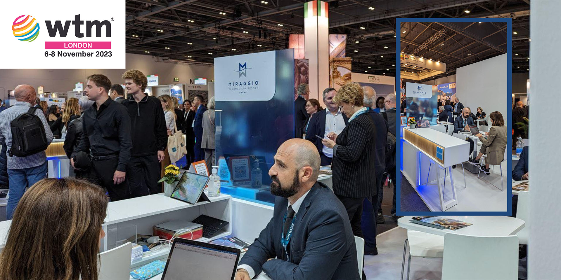 WTM London 2023 Miraggio Thermal Spa Resort team engaging with visitors at a busy exhibition stand