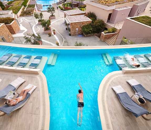 Miraggio Myrthia Thermal Spa pool and sunbeds