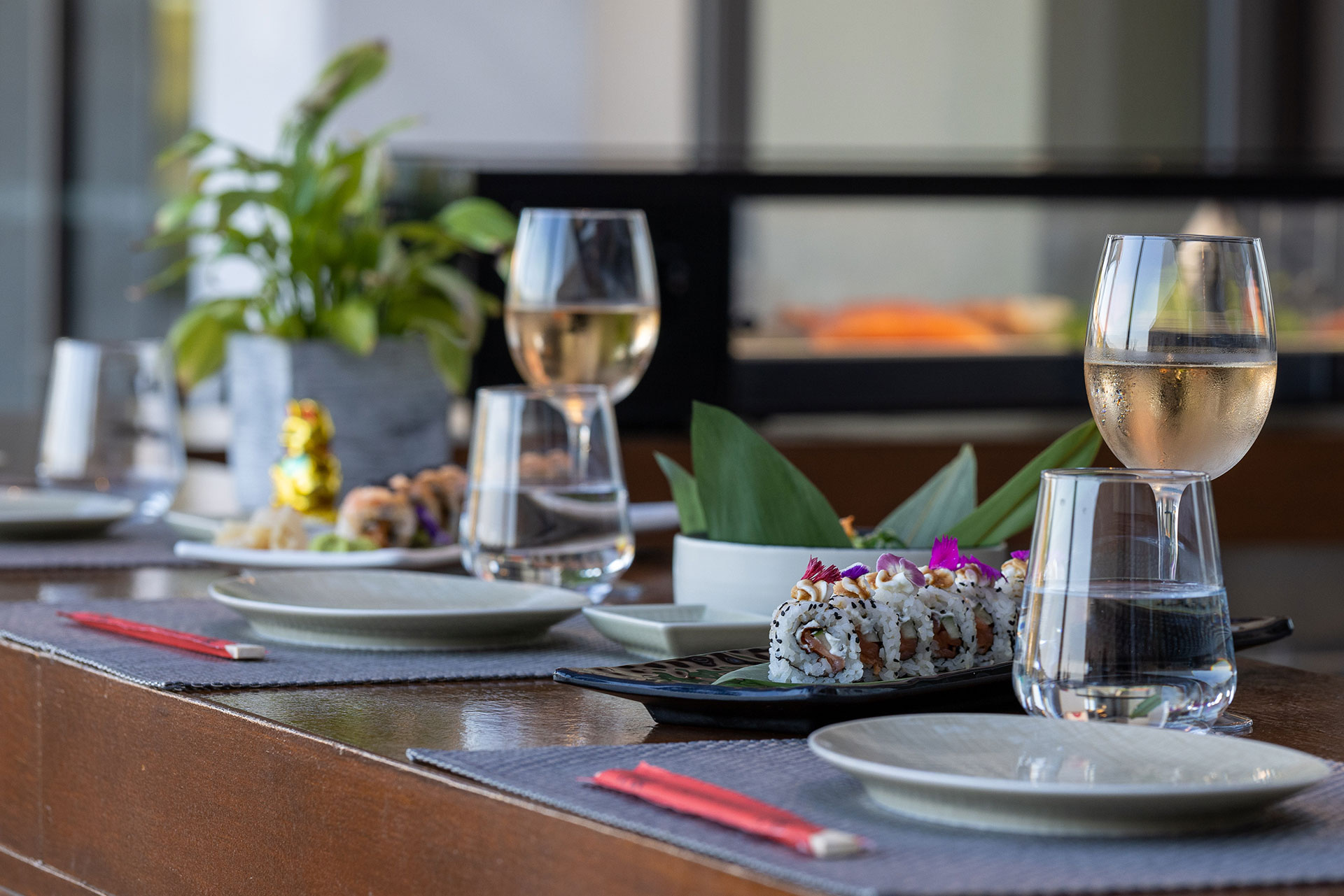 Sushi rolls and white wine served at the elegant Lobby Sushi Bar
