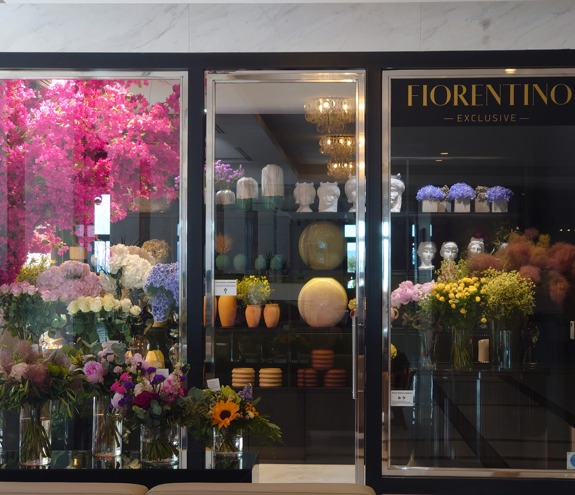 Fiorentino elegant flower shop display with colorful bouquets, vases, and decorative planters