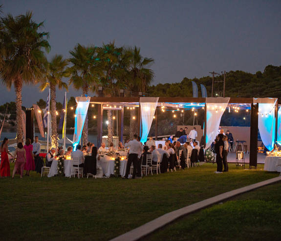 Miraggio Thermal Spa Resort wedding table area lit up at night time and guests