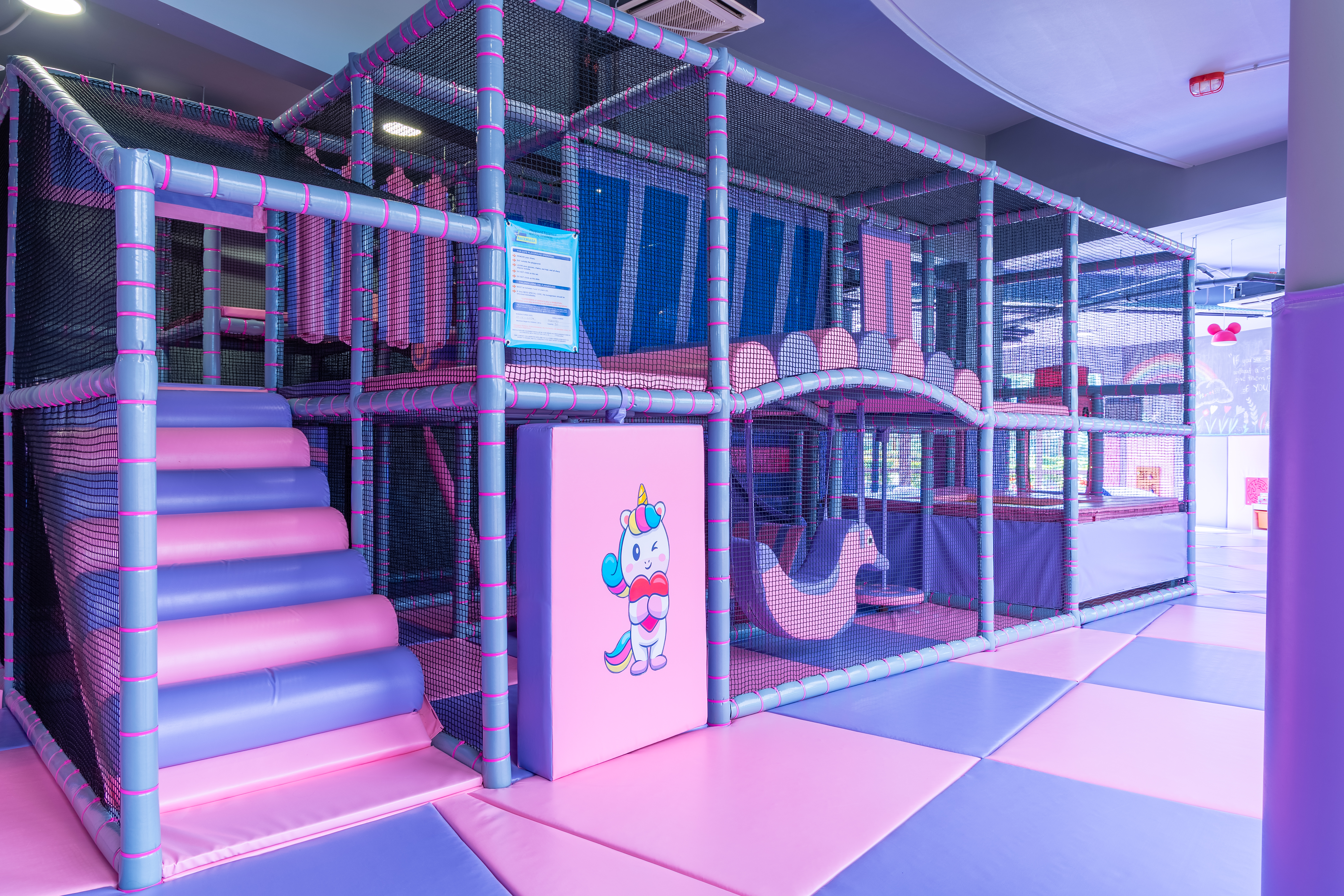 Soft play structure with colorful mats and climbing area at Kids Planet