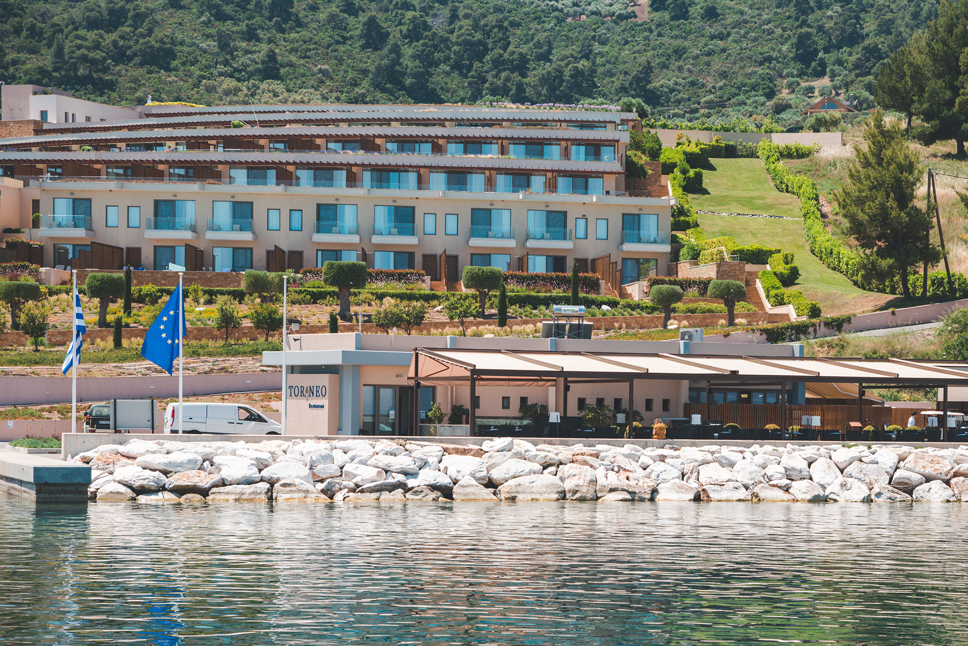 Toroneo restaurant exterior view from the marina with resort backdrop