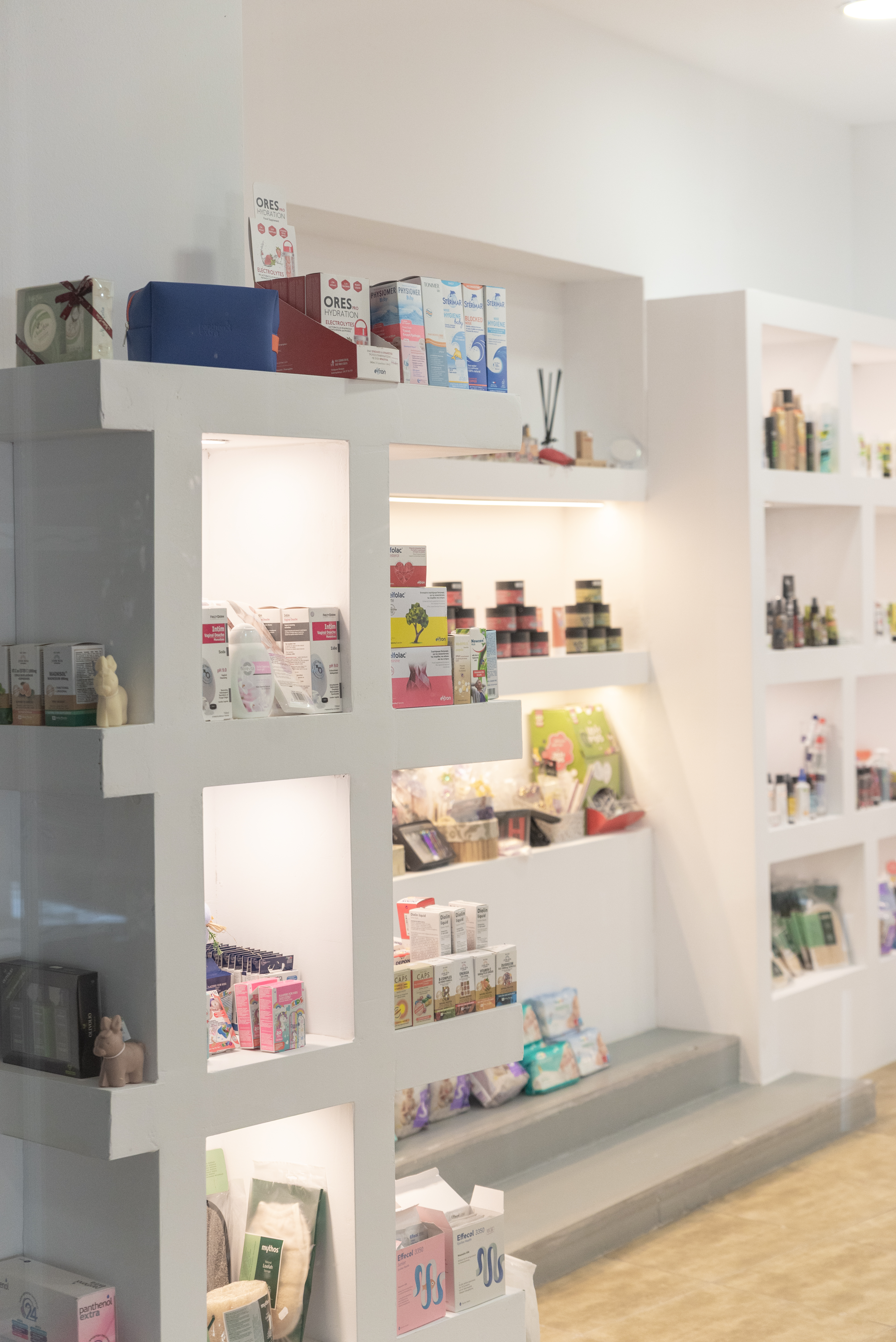 Shelves with beauty products, body creams, and soaps neatly arrannged