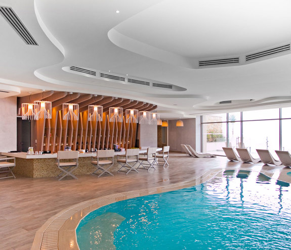 Myrthia Thermal Spa bar, pool and sunbeds