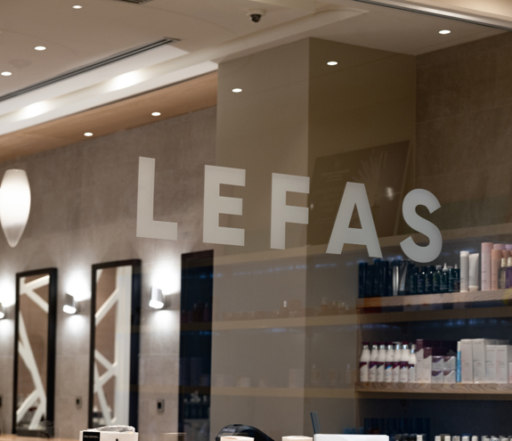 Lefas Hair Salon interior with mirrors and professional beauty products