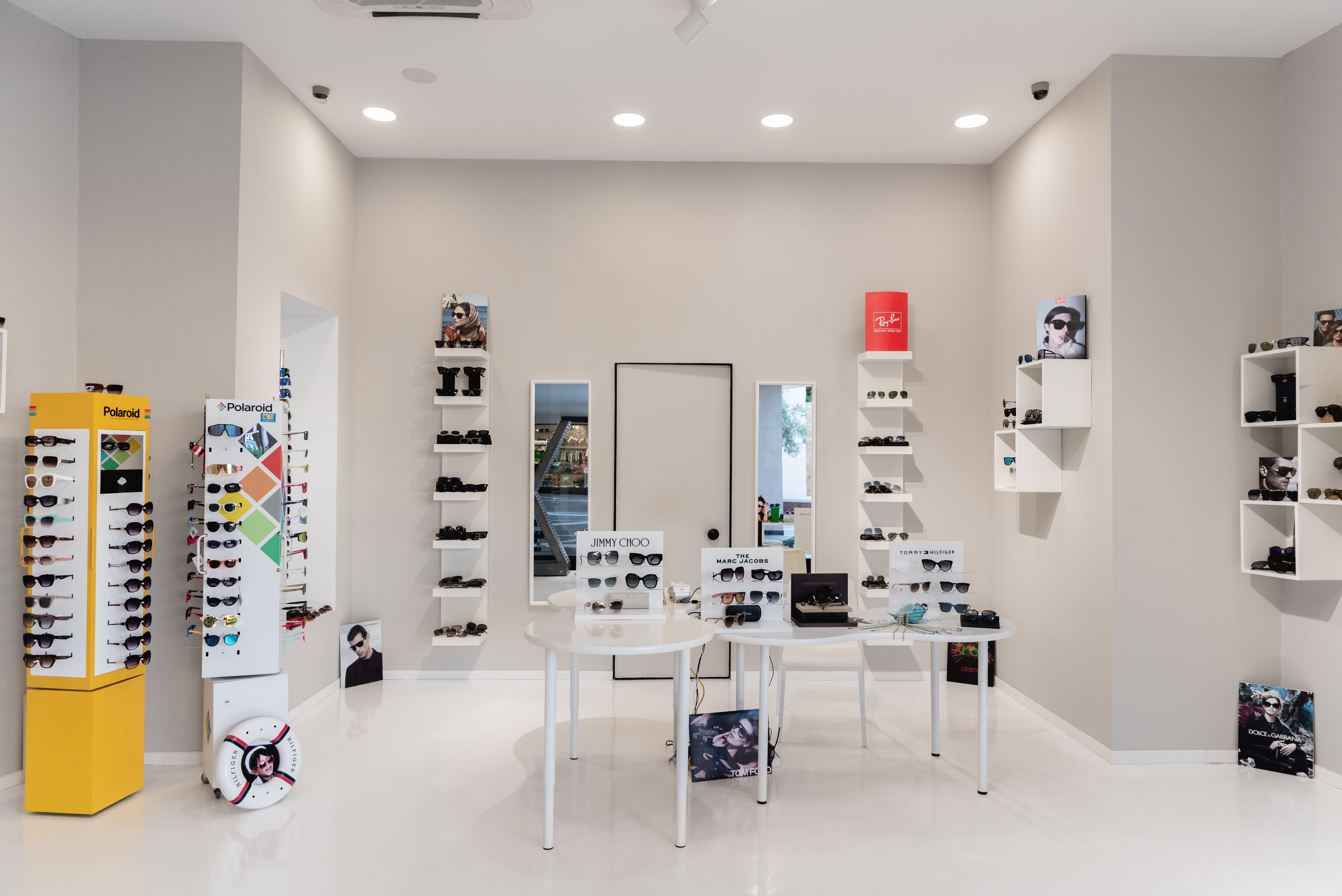 Optikon Xpress store interior with wide display of designer sunglasses
