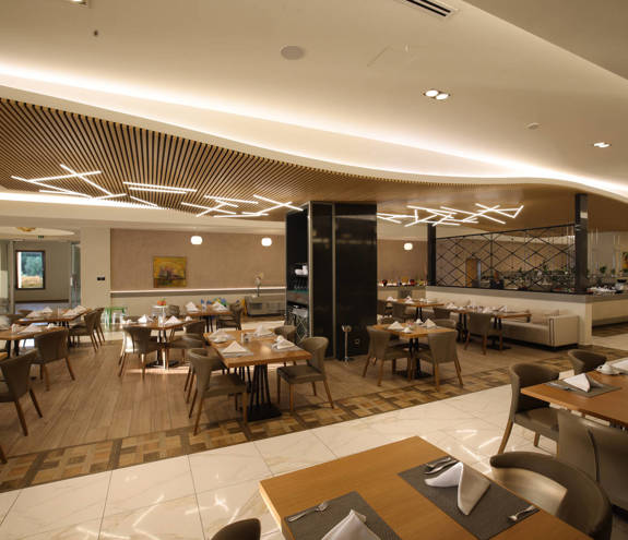 Interior of the elegant Kritamo restaurant with ambient lighting and cozy seating area