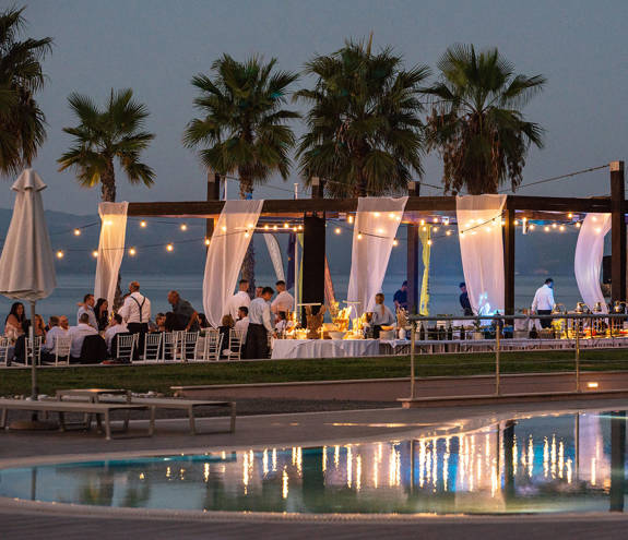 Miraggio Thermal Spa Resort wedding table area lit up at night time