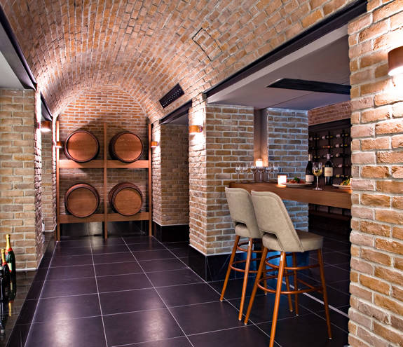 Sommelier's Restaurant wine barrels and bar