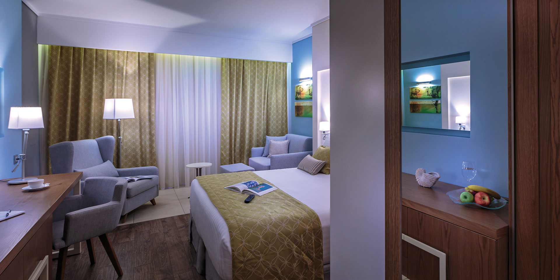 Elegant superior garden view room with warm lighting, modern furniture and relaxing ambiance 